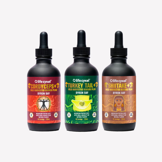 Three 120ml Lifecykel mushroom extracts on a white background