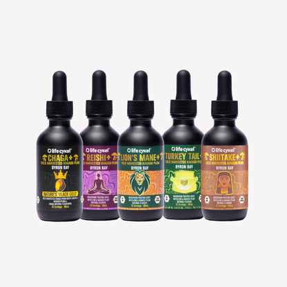 Five black bottles of Lifecykel mushroom extracts with droppers and colorful labels on a white background
