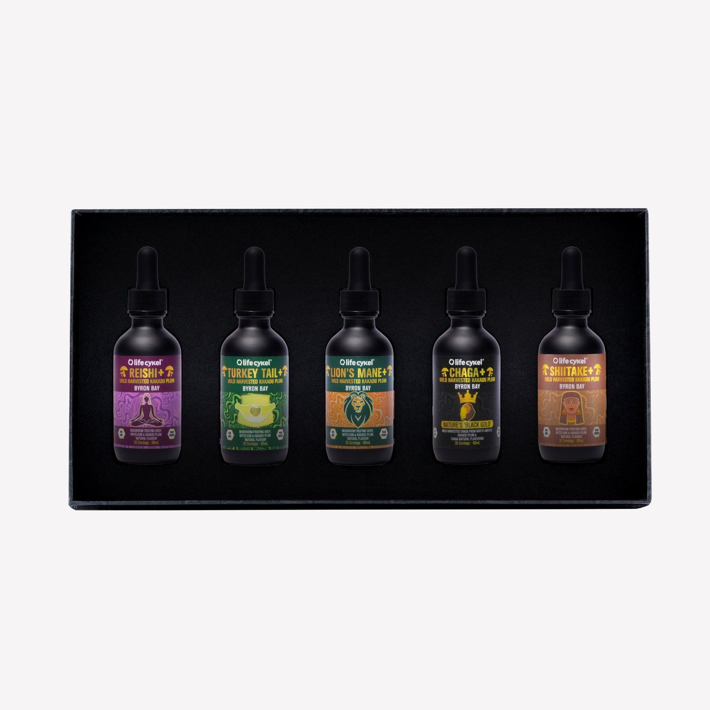 Five bottles of Lifecykel mushroom extracts in a black box on a white background