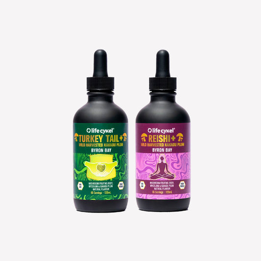 Two 120ml Lifecykel mushroom extracts  on a white background