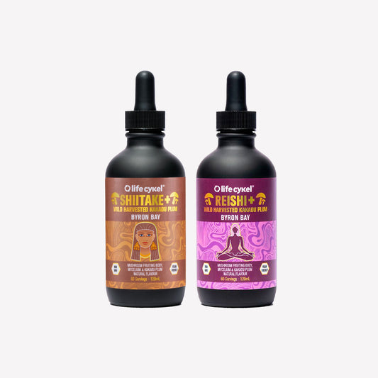Two 120ml Lifecykel mushroom extracts  labeled 'Shiitake' and 'Reishi' on a white background