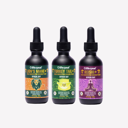 Three bottles of 60ml Lifecykel mushroom extracts with colorful labels on a white background